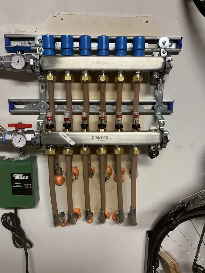 Plumber performing Water Heater Repair at a residential property in Goldsby