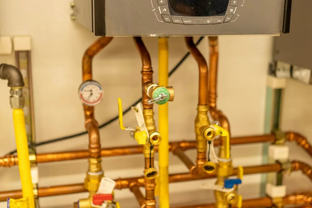 Licensed technician providing Backflow Prevention for a homeowner in Goldsby